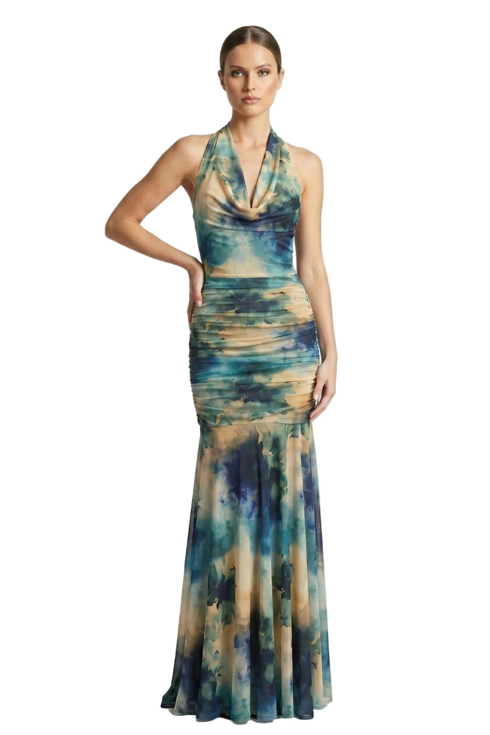 A model wearing a sleeveless halter-neck maxi dress with a teal, blue, and beige watercolor print, shown against a light gray studio background with the text 'WH7638 TEAL' in the upper left.