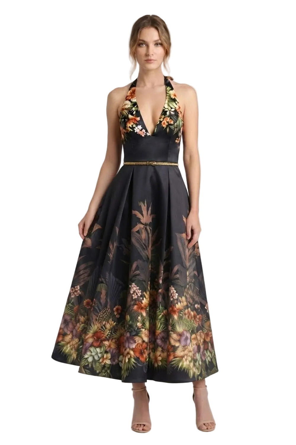 A woman modeling a sleeveless halter-neck maxi dress in black with a vibrant tropical floral and botanical print concentrated along the V-neckline, waist, and hem. The dress is shown against a light gray studio background with the text 'DM5136 BLACK' in the upper left corner.