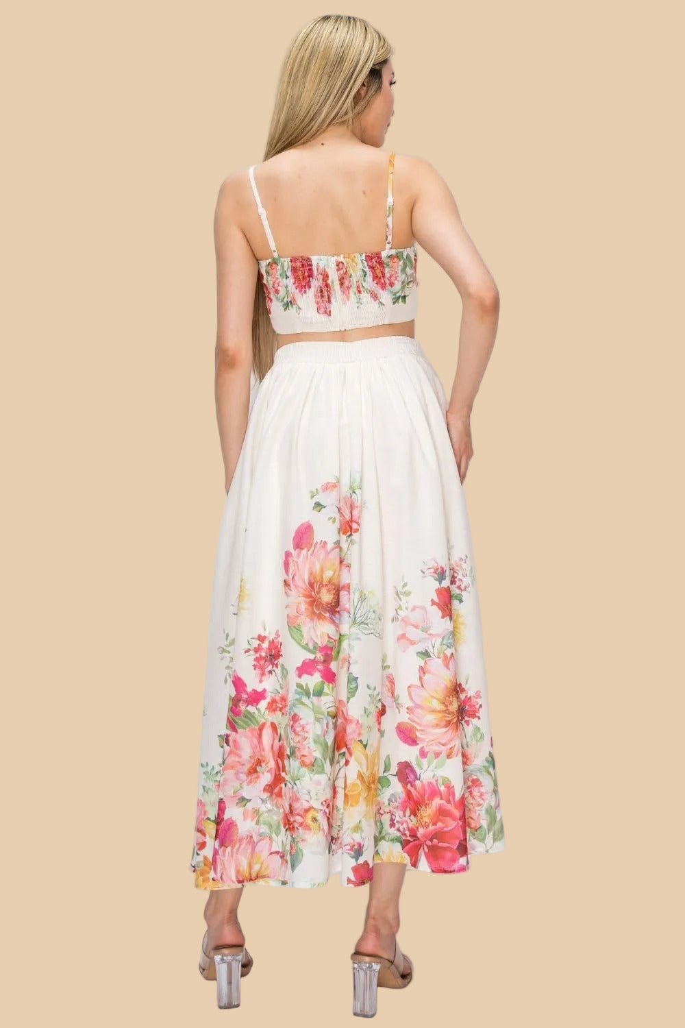 Woman wearing a floral two-piece outfit with 'WH7284 Ivory' text on a white background